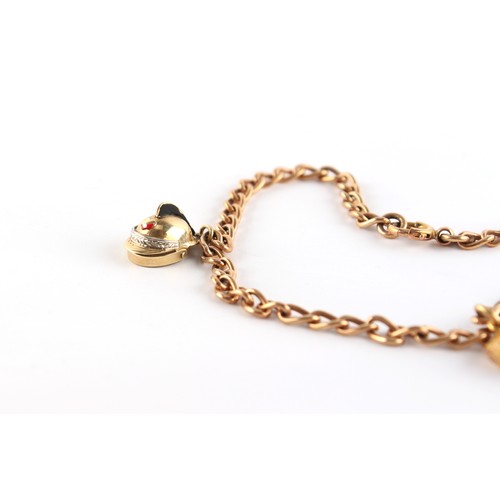 232 - Property of a lady - a 9ct gold chain bracelet with two 9ct gold charms, approximately 5.8 grams.