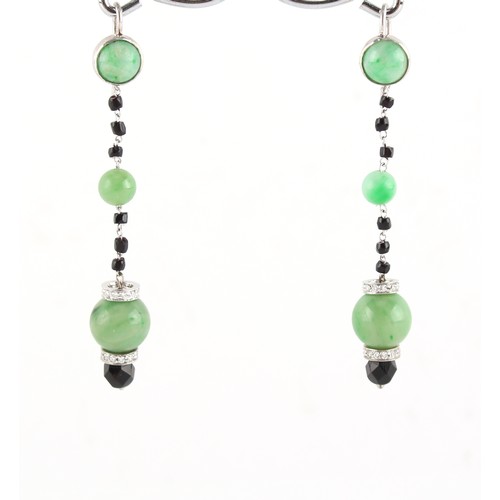 99 - A pair of jadeite & black onyx bead pendant earrings with diamond set collars, each approximately 59... 