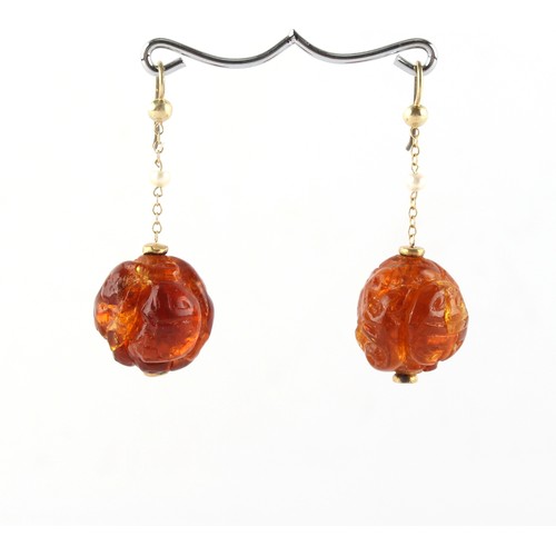 189 - A pair of amber ball & seed pearl pendant earrings, each approximately 46mm long (2).