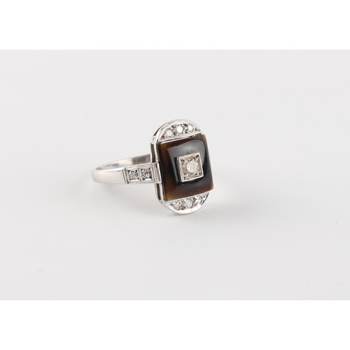 100 - An Art Deco style platinum or white gold black onyx & diamond ring, the head measuring approximately... 