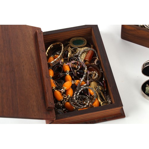 166 - A box containing assorted costume jewellery.