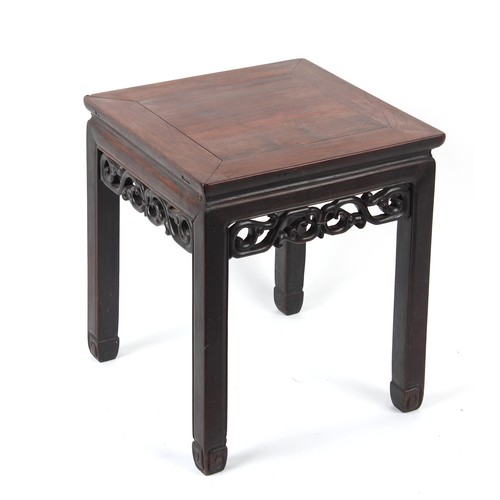 22 - A late 19th century Chinese hongmu table with carved frieze, 17.75 by 17.5ins. (45 by 44.5cms.).