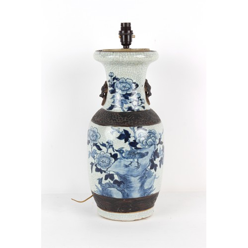 90 - Property of a deceased estate - a Chinese blue & white crackle glazed vase, circa 1900, adapted as a... 