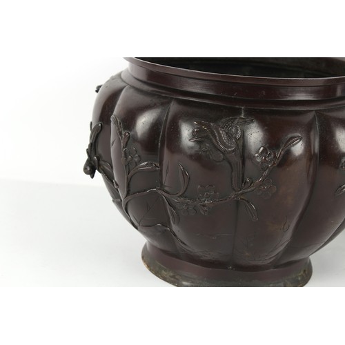 125 - Property of a lady - a late 19th Japanese bronze planter, of lobed form, decorated in relief with bi... 