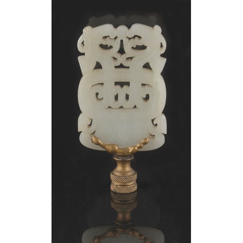 73 - Property of a lady - a Chinese carved white jade pendant plaque adapted as a lampshade finial, 3.7in... 