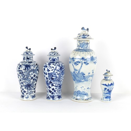 95 - Property of a gentleman - a pair of late 19th century Chinese blue & white baluster vases & covers, ... 