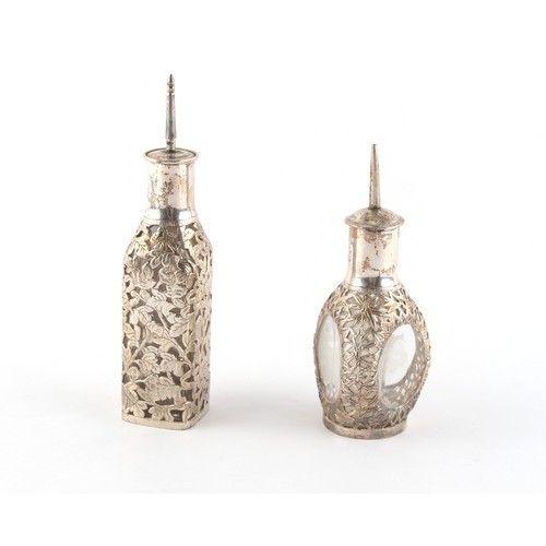 36 - Property of a gentleman - two Chinese sterling silver mounted scent bottles with covers, by Wai Kee,... 