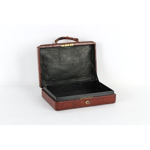 168 - Property of a lady - an early 20th century crocodile skin attache case, with Bramah lock & key, reta... 