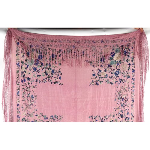 41 - Property of a lady - an early 20th century Chinese embroidered silk shawl, decorated with flowers on... 