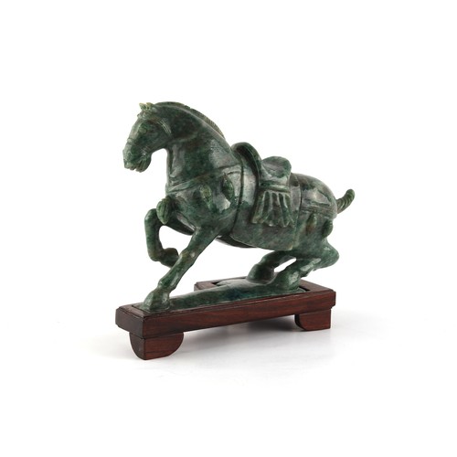 53 - Property of a lady - a Chinese Tang style carved nephrite jade model of a horse, the base re-stuck, ... 