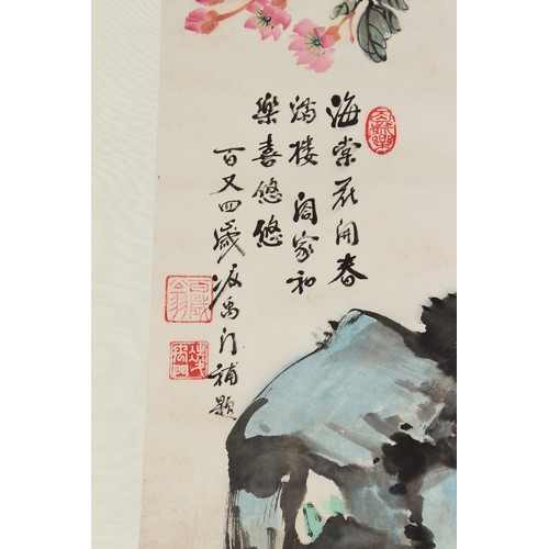 61 - A Chinese scroll painting on paper depicting flowers and rockwork, signed with calligraphy and seven... 