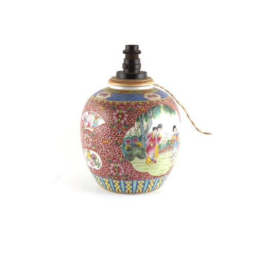 113 - Property of a lady - a Chinese famille rose ruby ground ovoid jar, first half 20th century, iron red... 