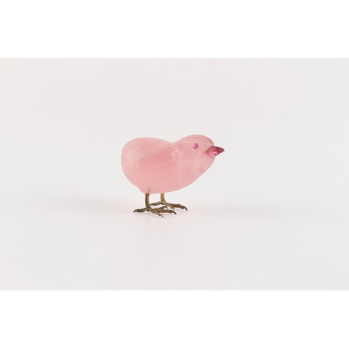 11 - A Chinese carved rose quartz model of a Chick, small chip to one wing, 2.1ins. (5.3cms.) long.