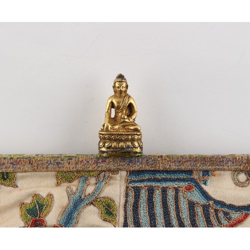 16 - A small Chinese gilt bronze figure of a Seated Buddha, probably Ming Dynasty (1368-1644), 1.25ins. (... 