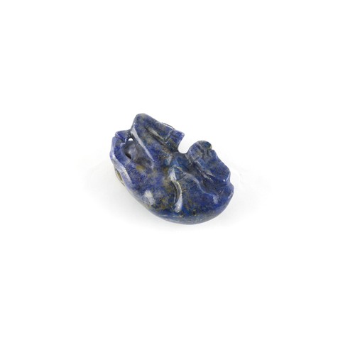 17 - A Chinese carved lapis lazuli model of a Recumbent Buffalo, 2.2ins. (5.6cms.) long.