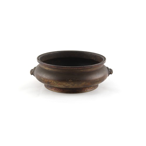 7 - A Chinese bronze two handled censer, of squat bombe form, 18th century, apocryphal Xuande 6-characte... 