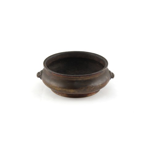 7 - A Chinese bronze two handled censer, of squat bombe form, 18th century, apocryphal Xuande 6-characte... 