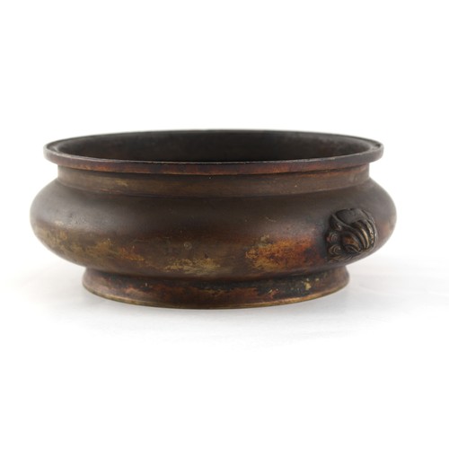 7 - A Chinese bronze two handled censer, of squat bombe form, 18th century, apocryphal Xuande 6-characte... 