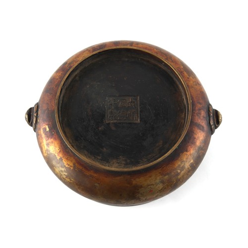 7 - A Chinese bronze two handled censer, of squat bombe form, 18th century, apocryphal Xuande 6-characte... 