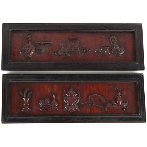 8 - Property of a lady - an unusual pair of late 19th century Chinese carved huanghuali panels, each car... 