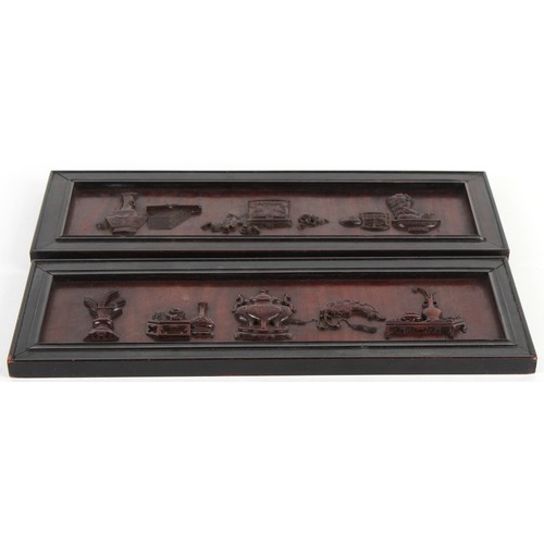 8 - Property of a lady - an unusual pair of late 19th century Chinese carved huanghuali panels, each car... 