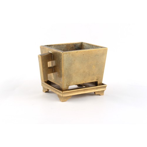 6 - A Chinese bronze rectangular censer with stand, 18th / 19th century, the censer with 4-character mar... 