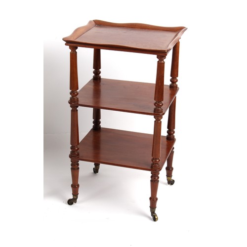 226E - Property of a gentleman - an early Victorian mahogany three-tier whatnot with dish top & turned supp... 