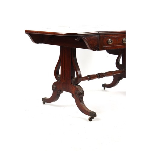 217 - Property of a lady - an early 19th century Regency period mahogany & rosewood banded sofa table, wit... 