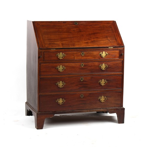 219 - Property of a lady - a late 18th century George III mahogany fall-front bureau, with four long gradu... 