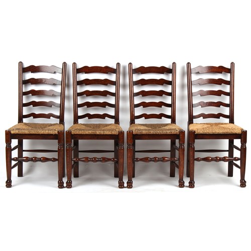 224 - Property of a lady - a set of eight rush seated ladder-back dining chairs, 20th century, including t... 