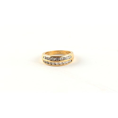 47 - Property of a lady - an 18ct yellow gold ring set with two rows of nine round brilliant cut diamonds... 