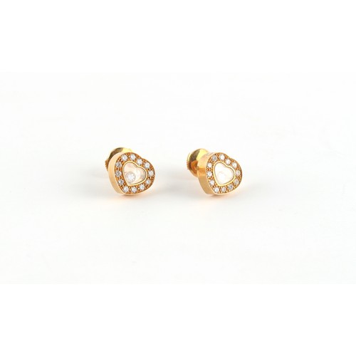 71 - Property of a lady - Chopard - a pair of 18ct yellow gold heart shaped 'Happy Diamonds' stud earring... 