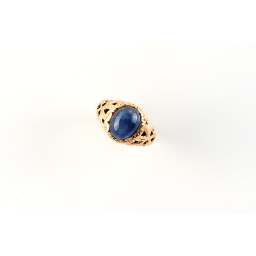 53 - A yellow gold cabochon sapphire ring, the oval cabochon sapphire weighing approximately 4.82 carats,... 