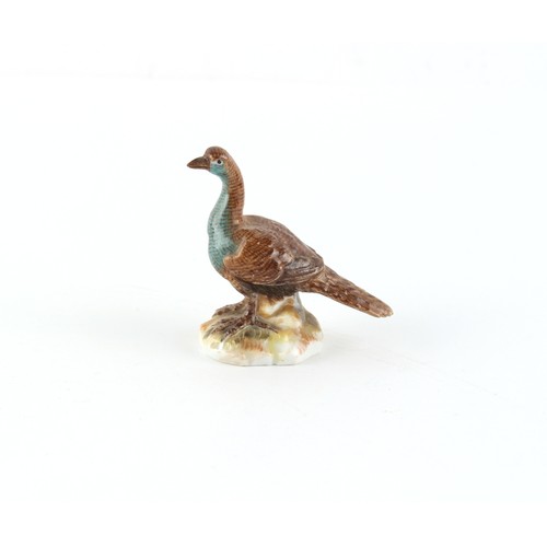 241 - Property of a lady - a Meissen miniature model of a ptarmigan, 1.95ins. (4.9cms.) high; together wit... 