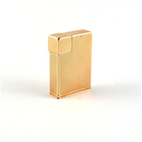 159 - Property of a lady - Cartier - a Cartier 9ct gold lighter, signed 'Cartier London' and numbered 1403... 