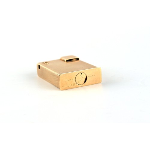 159 - Property of a lady - Cartier - a Cartier 9ct gold lighter, signed 'Cartier London' and numbered 1403... 