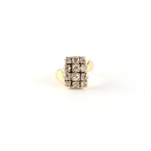 38 - Property of a deceased estate - a modern 18ct yellow gold diamond rectangular panel ring, the twelve... 