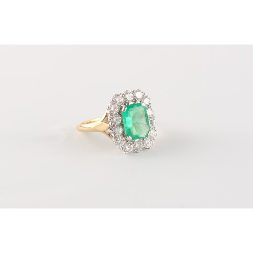 114 - An 18ct yellow gold certificated Colombian emerald & diamond ring, the octagonal mixed cut emerald w... 