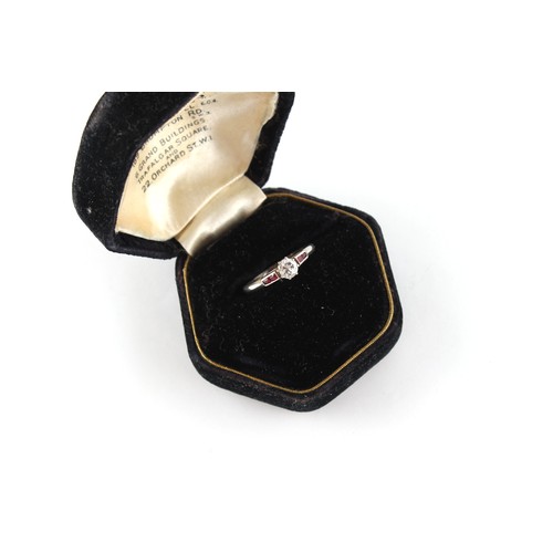 57 - Property of a gentleman - a platinum diamond & ruby ring, the round brilliant cut diamond weighing a... 