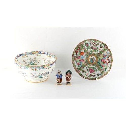 240 - Property of a lady - an early 20th century Mintons punch bowl painted in the Chinese style with bird... 