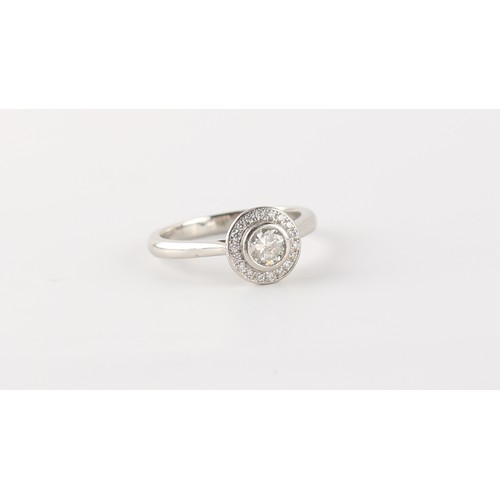 59 - A platinum diamond circular cluster ring, the centre round brilliant cut diamond weighing approximat... 