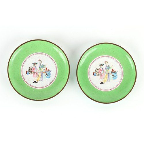 185 - Property of a lady - a pair of Chinese Canton enamel European subject circular dishes, late Qing Dyn... 