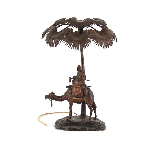 164 - A large early 20th century Austrian cold painted bronze lamp modelled as a Arab Warrior on a Camel b... 