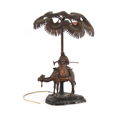 164 - A large early 20th century Austrian cold painted bronze lamp modelled as a Arab Warrior on a Camel b... 