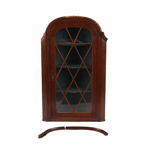 215 - Property of a deceased estate - a George III mahogany corner wall cabinet with tracery glazed door e... 