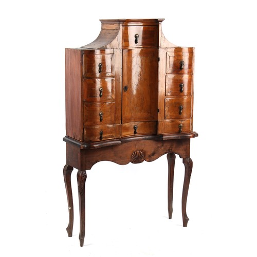 221 - Property of a lady - an 18th century Continental walnut cabinet with an arrangement of ten drawers a... 