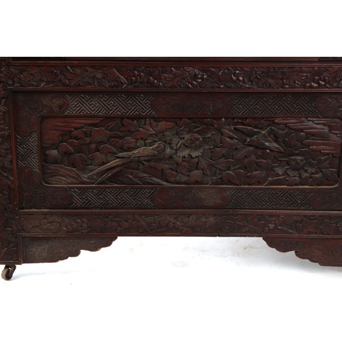 172 - Property of a gentleman - a late 19th century Japanese Meiji period carved two fold screen with moth... 