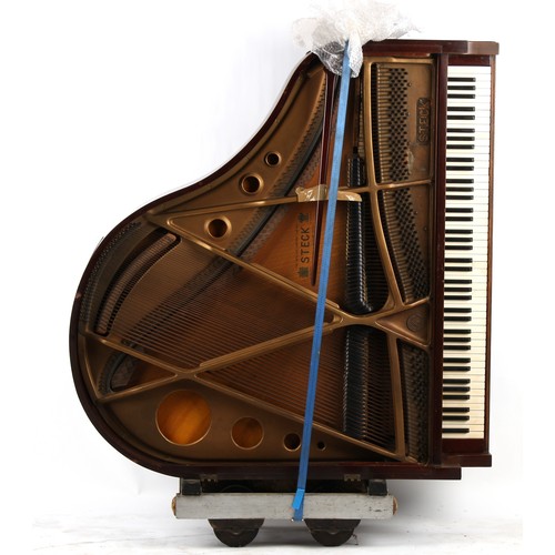 205 - Property of a deceased estate - an early 20th century Steck mahogany cased over strung baby grand pi... 