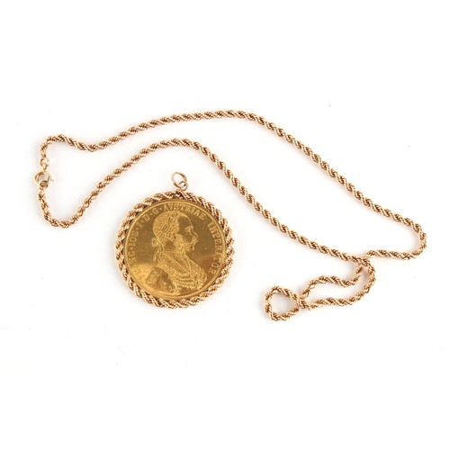 70 - Property of a lady - a 1915 Austrian 4 ducats gold coin mounted in a 14ct gold rope-twist pendant fr... 