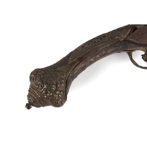 207 - Property of a lady - a large pair of 19th century Turkish flintlock pistols, the white metal mounts ... 